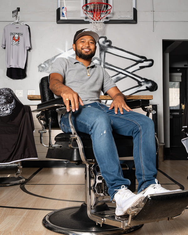 Jim Tiew, barber at Boneyard Barbering Logan