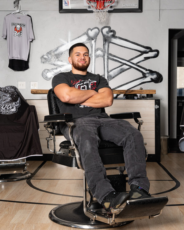 Aleks Bacerra, barber at Boneyard Barbering Logan