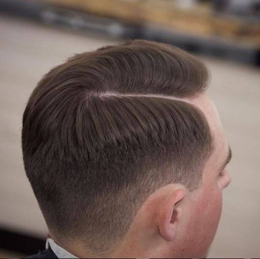 Side part with hard part and skin fade, styled with Boneyard Matte Pomade